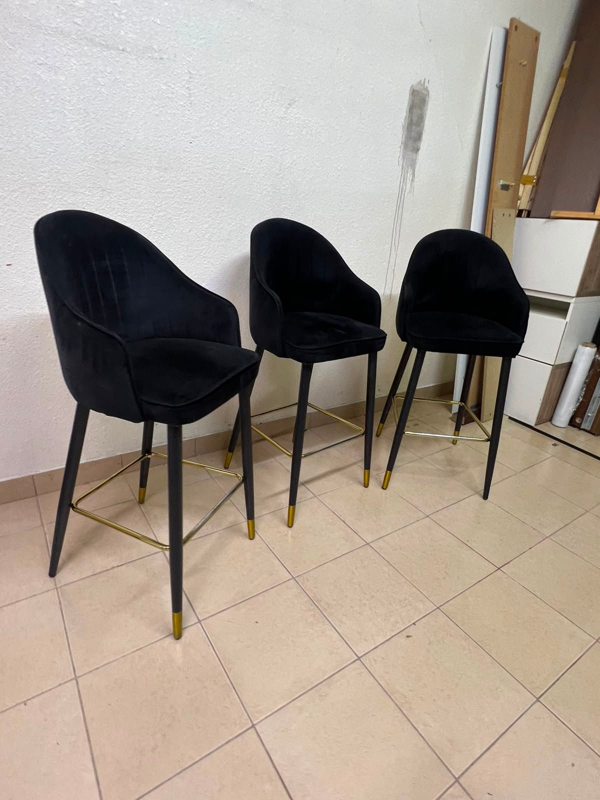 This black velvet bar stool from TUKA features a round design and black legs with gold accents. - Image 2