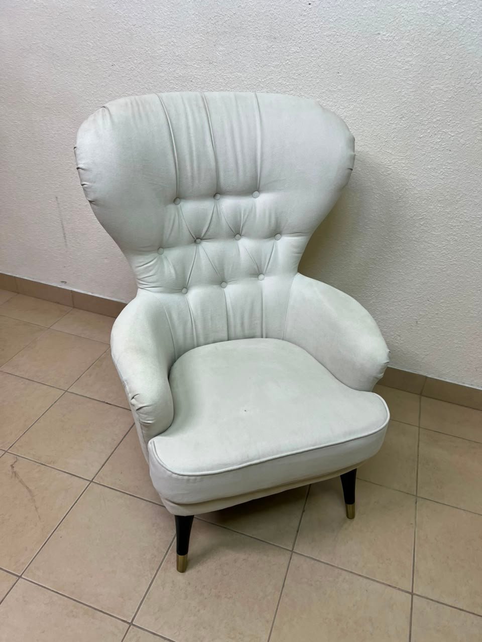 This wingback chair from AD CORE features white upholstery and a tufted back. - Image 3