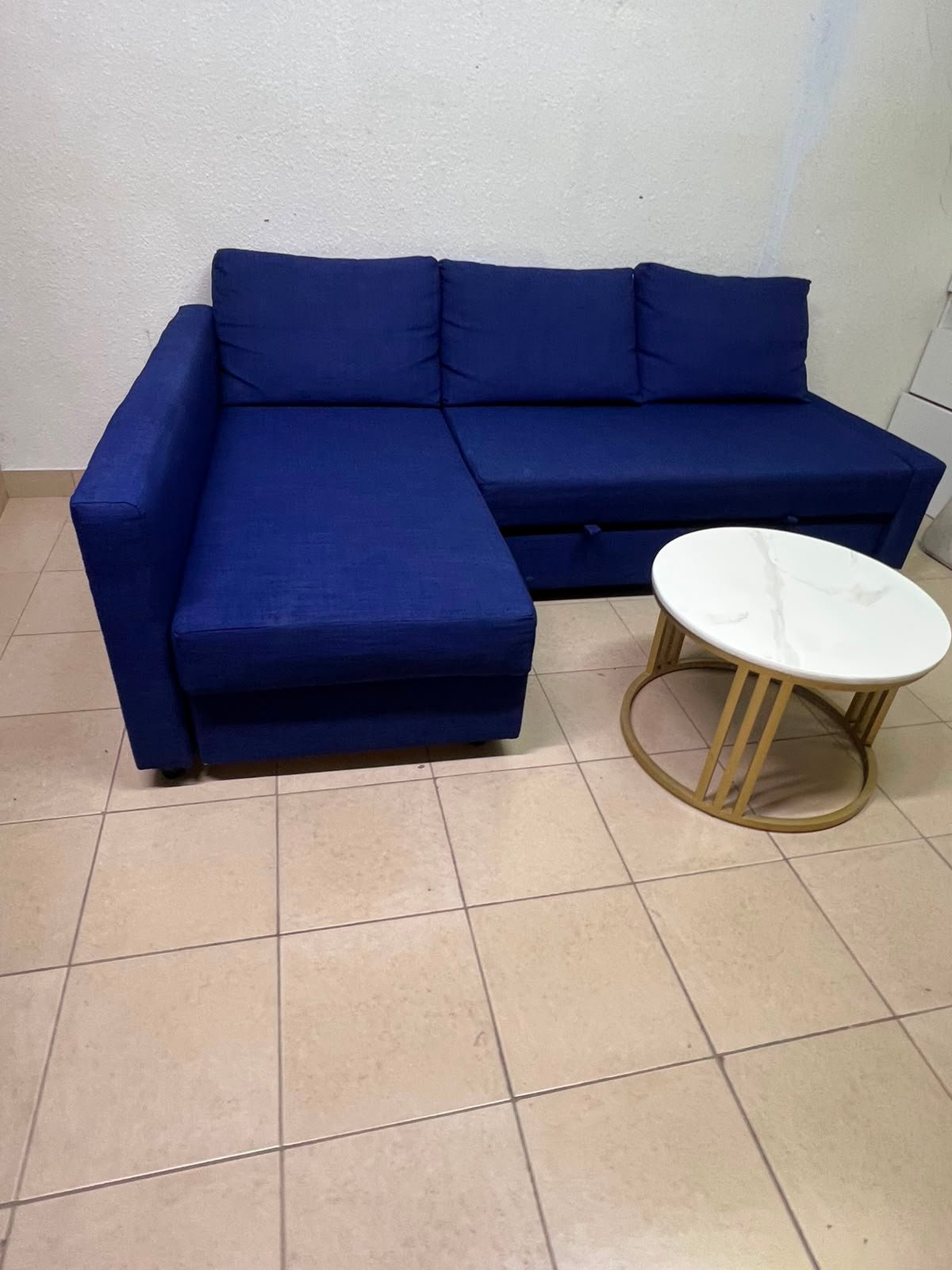 The IKEA FRIHETEN corner sofa-bed comes in dark blue and features built-in storage. - Image 7