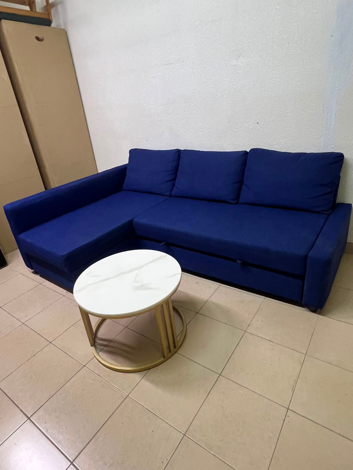 The IKEA FRIHETEN corner sofa-bed comes in dark blue and features built-in storage. - Image 15
