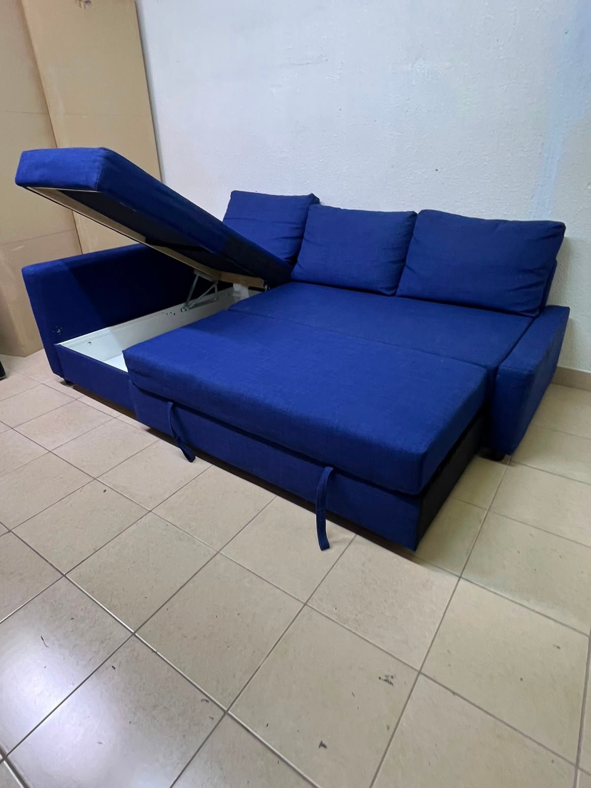 The IKEA FRIHETEN corner sofa-bed comes in dark blue and features built-in storage. - Image 18