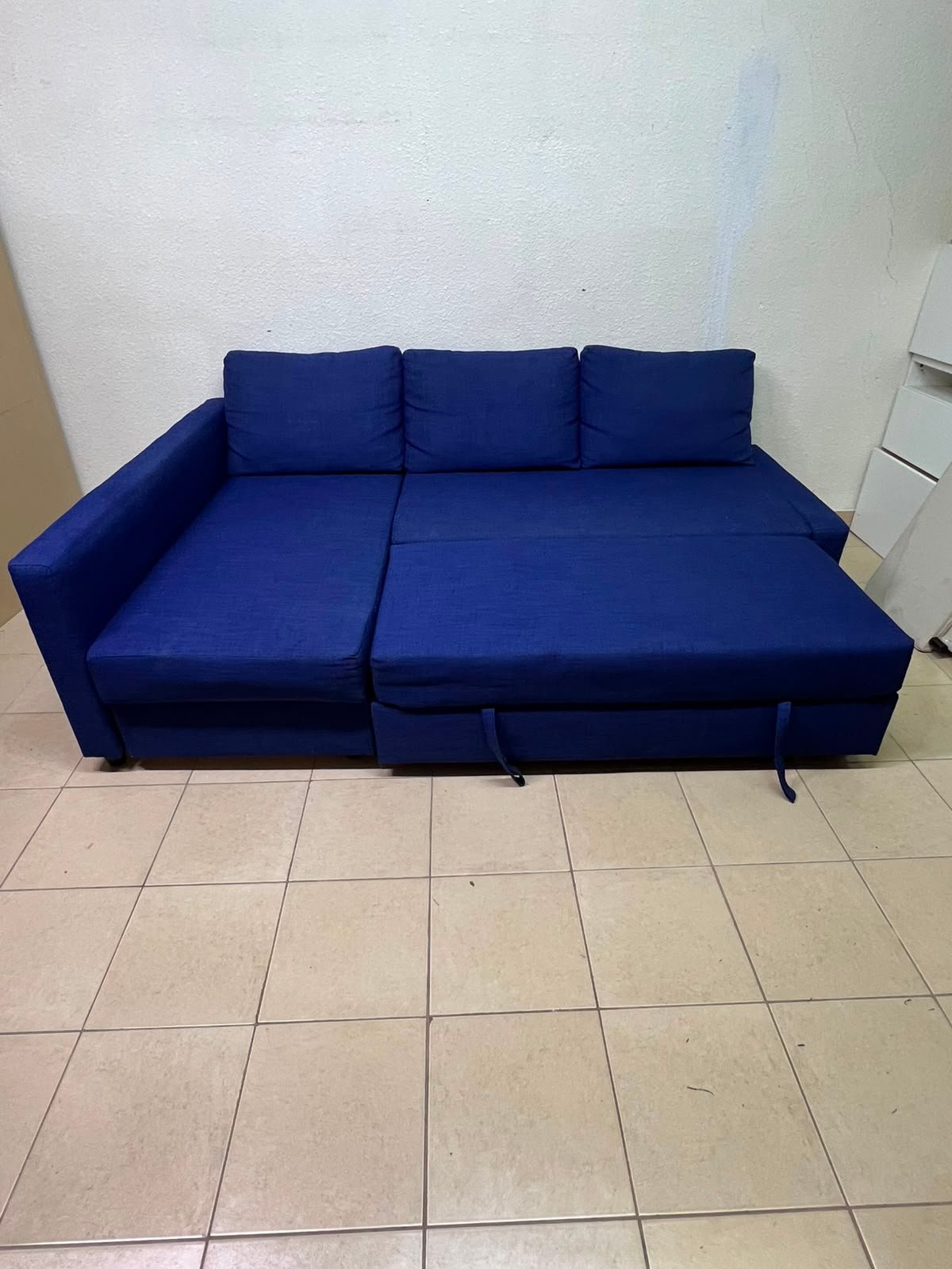 The IKEA FRIHETEN corner sofa-bed comes in dark blue and features built-in storage. - Image 2