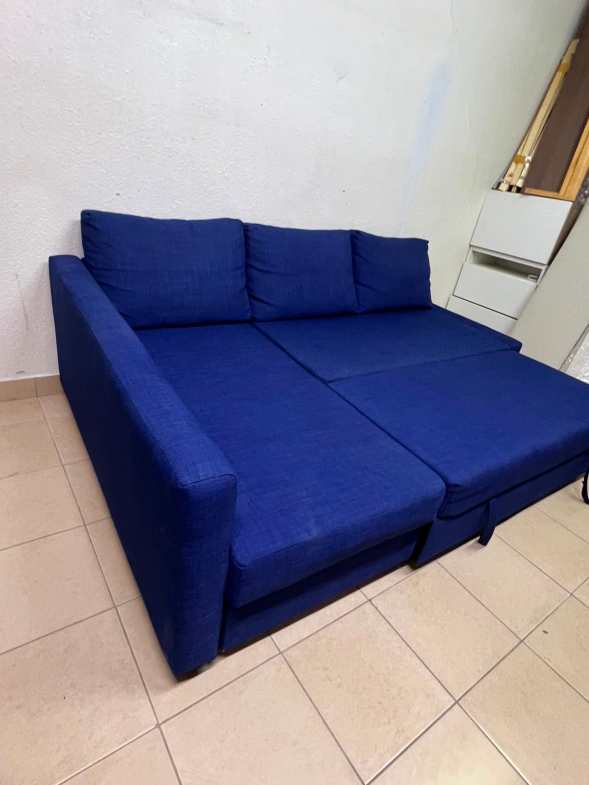 The IKEA FRIHETEN corner sofa-bed comes in dark blue and features built-in storage. - Image 17