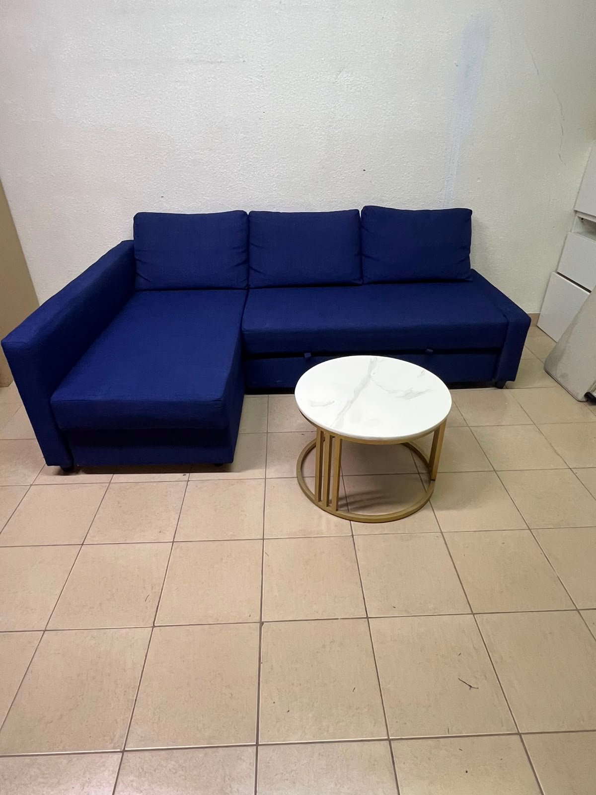 The IKEA FRIHETEN corner sofa-bed comes in dark blue and features built-in storage. - Image 3