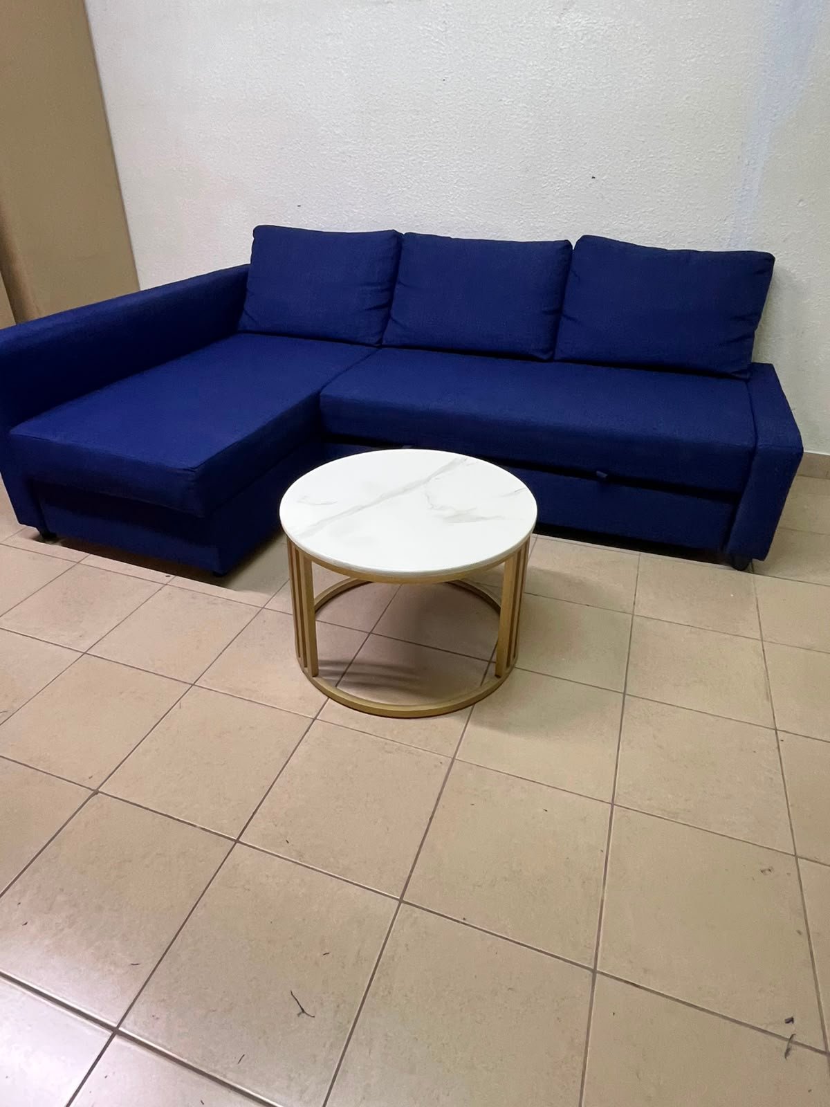 The IKEA FRIHETEN corner sofa-bed comes in dark blue and features built-in storage. - Image 6