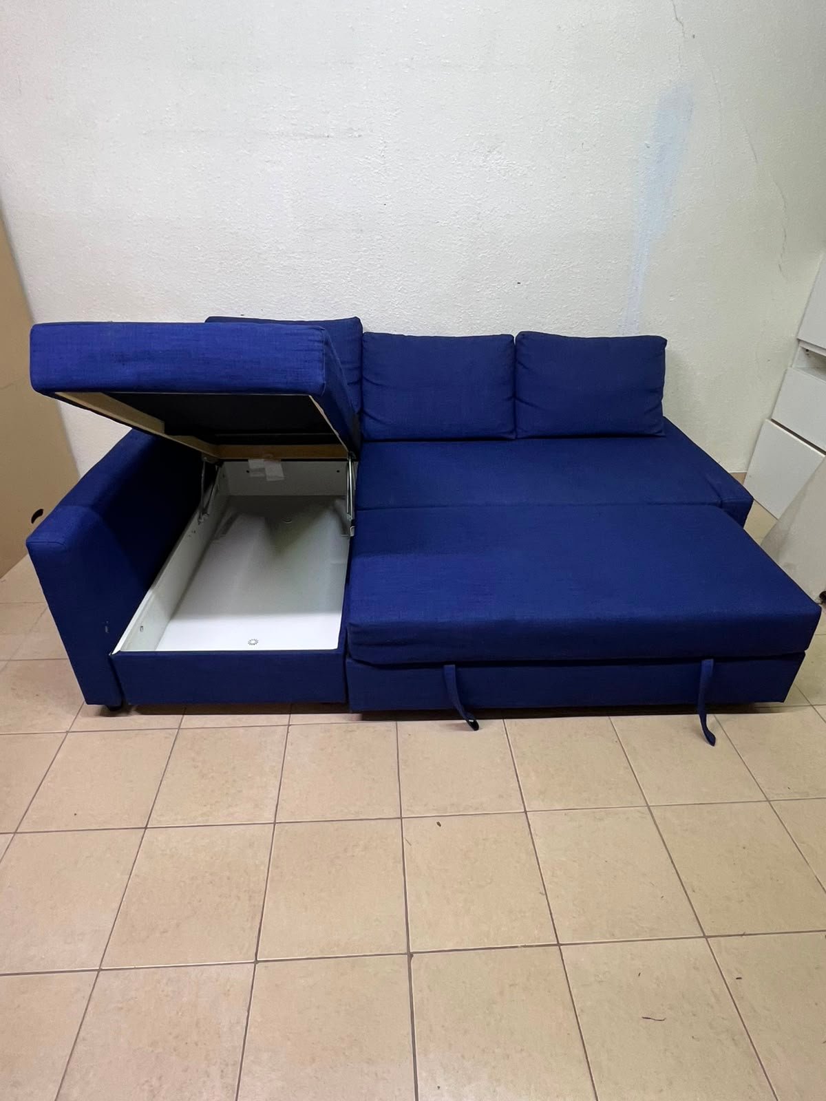 The IKEA FRIHETEN corner sofa-bed comes in dark blue and features built-in storage. - Image 10