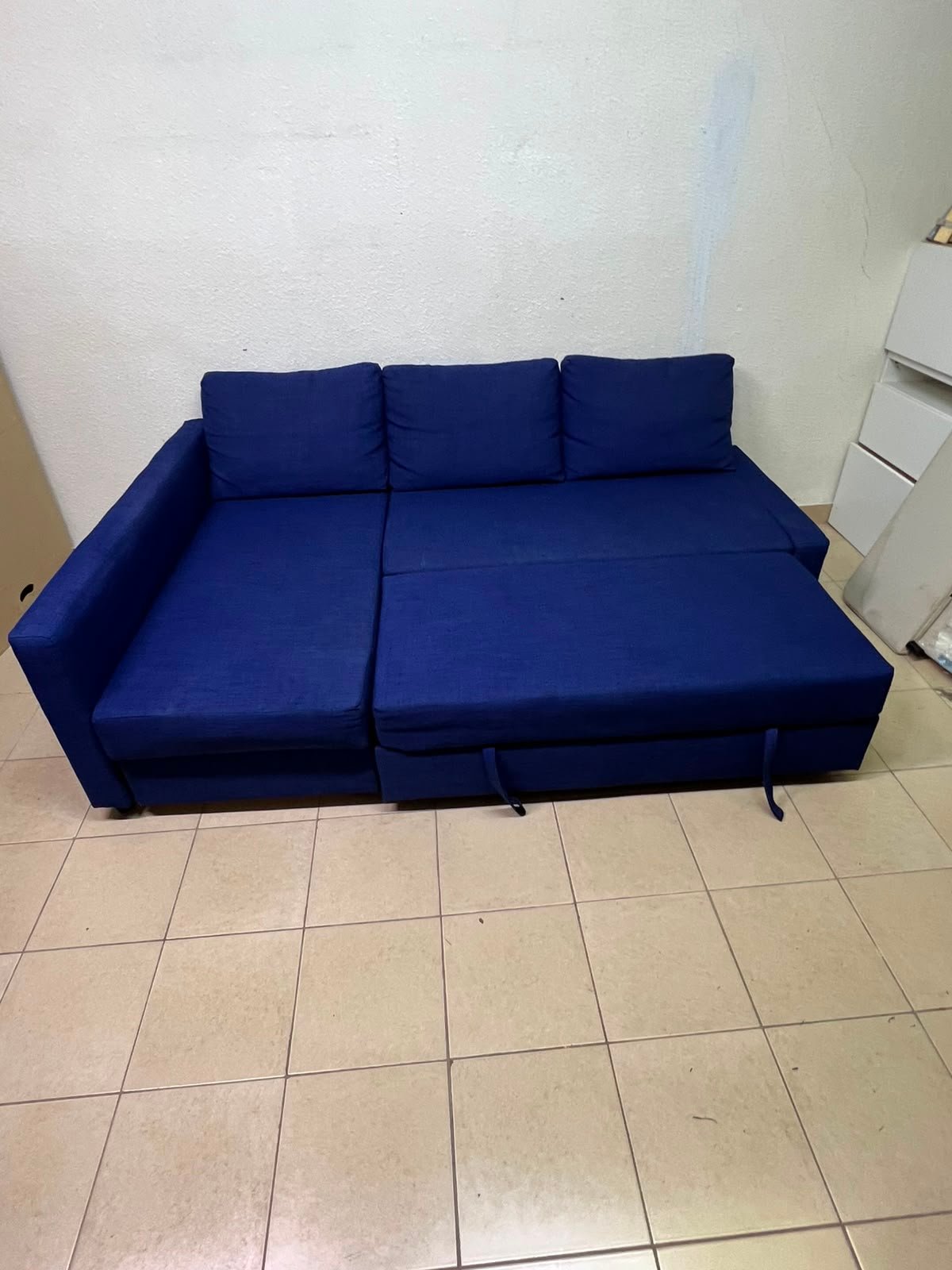 The IKEA FRIHETEN corner sofa-bed comes in dark blue and features built-in storage. - Image 9