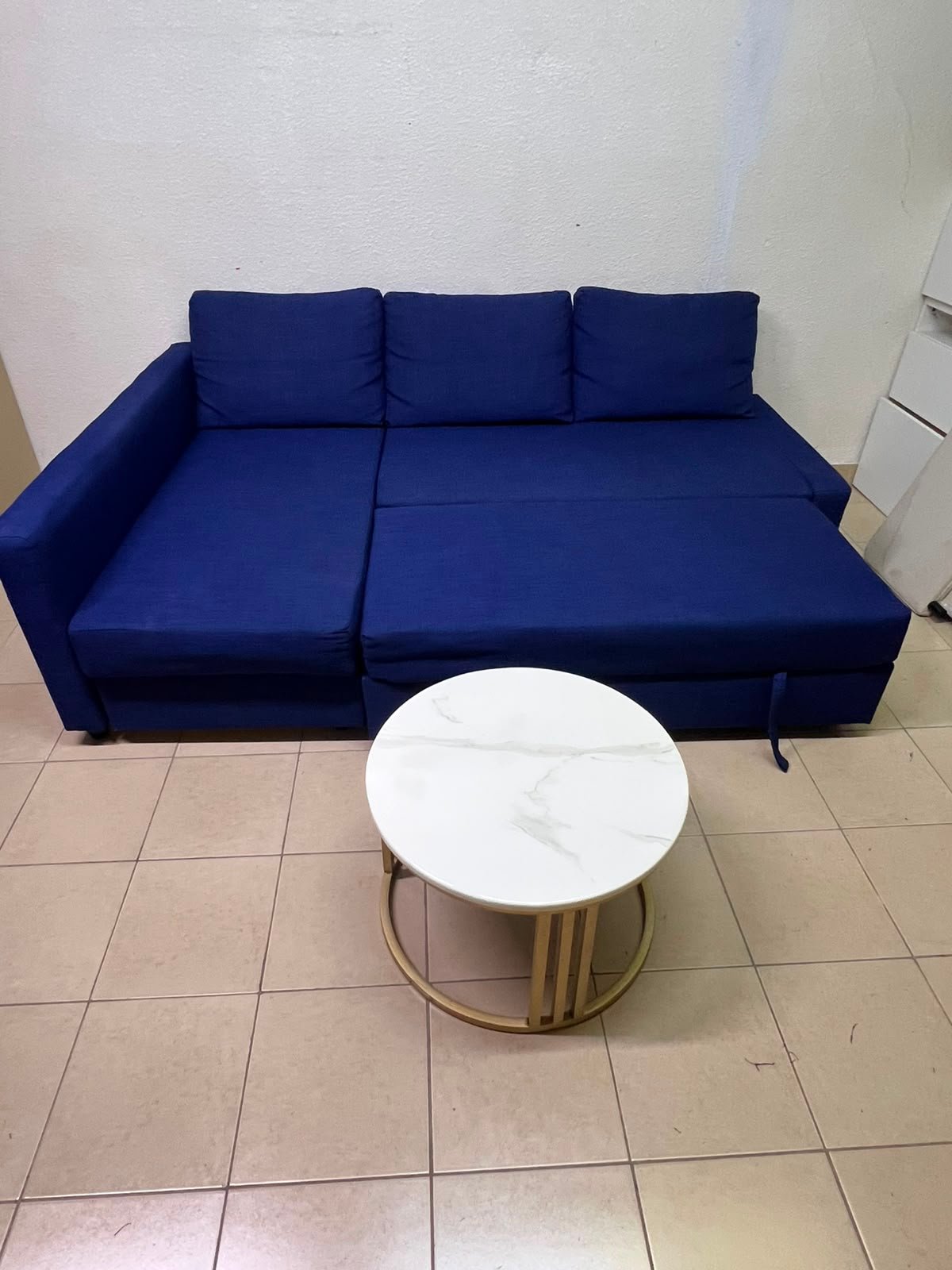 The IKEA FRIHETEN corner sofa-bed comes in dark blue and features built-in storage. - Image 11