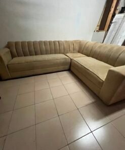Modern corner sofa set in beige with a striped back and velvet design.