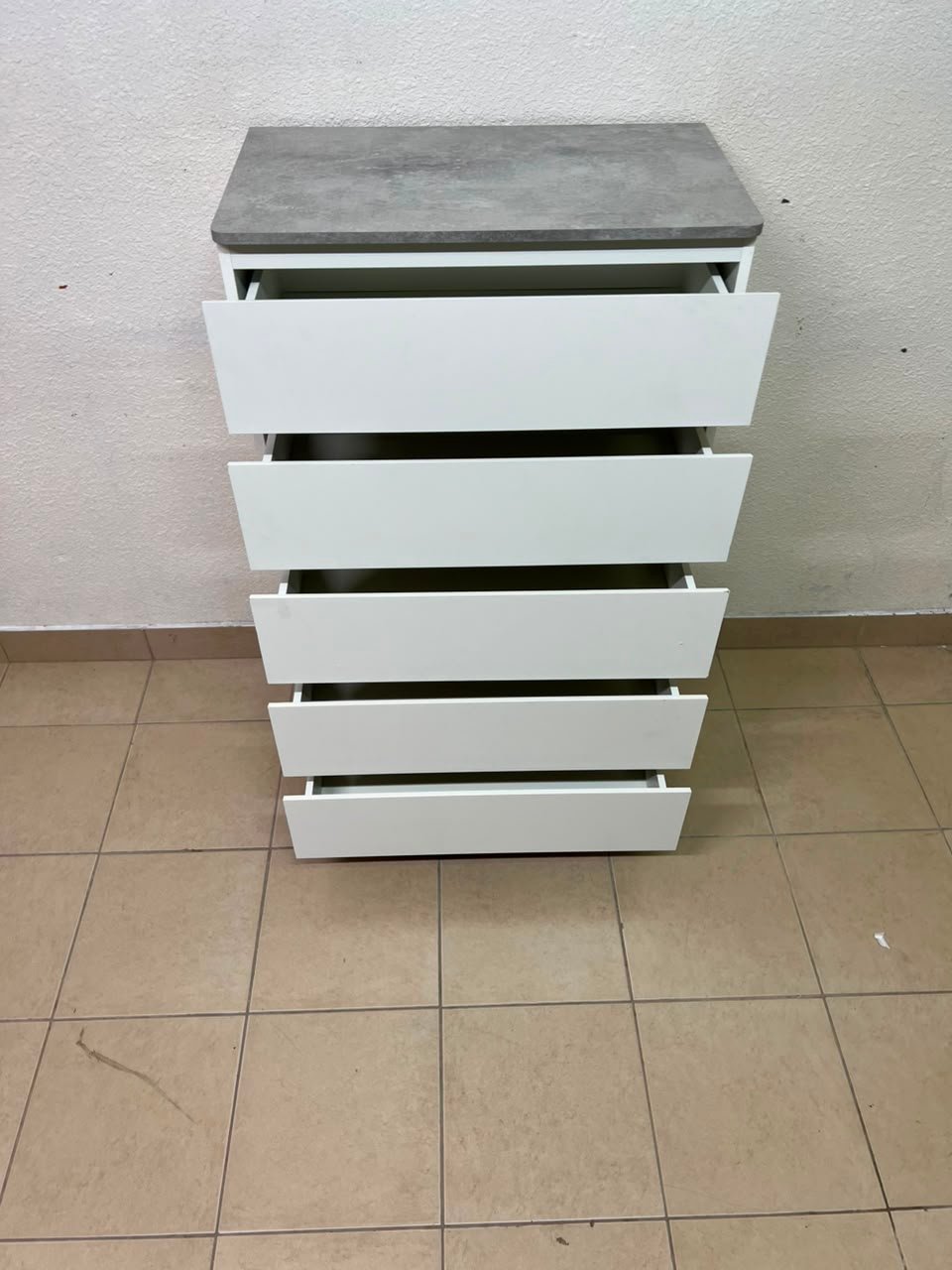 A modern white chest of drawers with a concrete-gray top, similar to models like the Colin from IKEA - Image 7