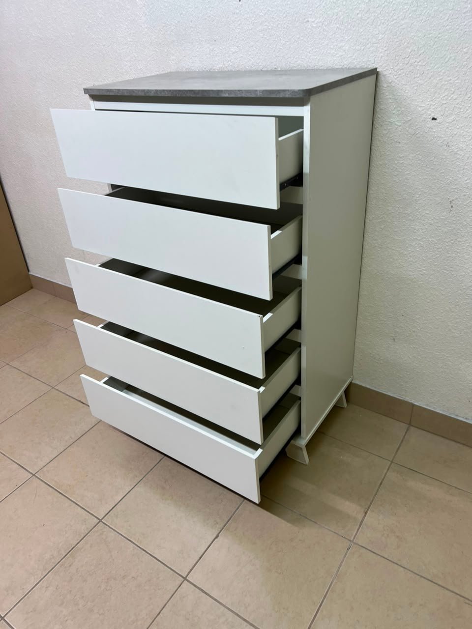 A modern white chest of drawers with a concrete-gray top, similar to models like the Colin from IKEA - Image 10