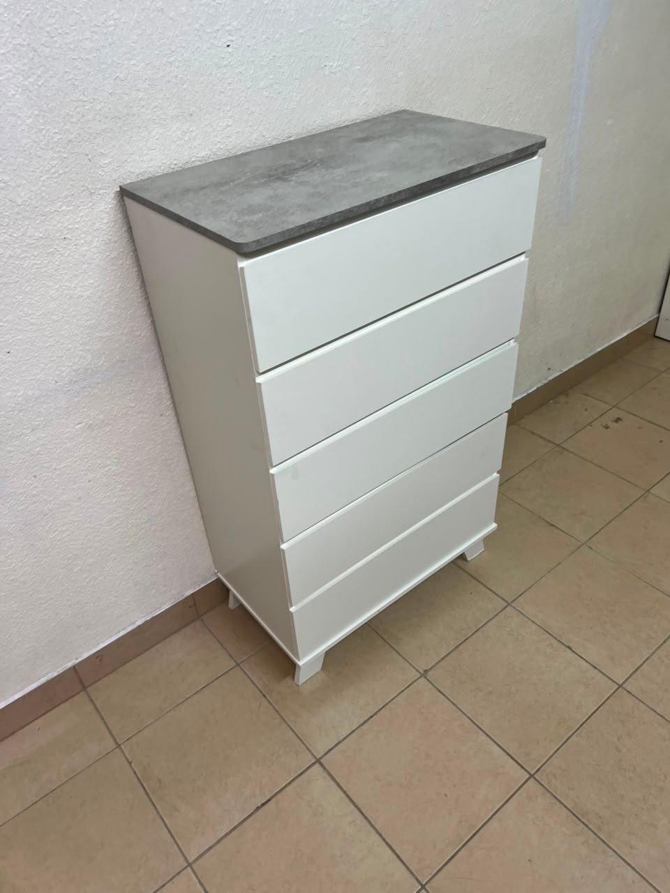 A modern white chest of drawers with a concrete-gray top, similar to models like the Colin from IKEA - Image 16