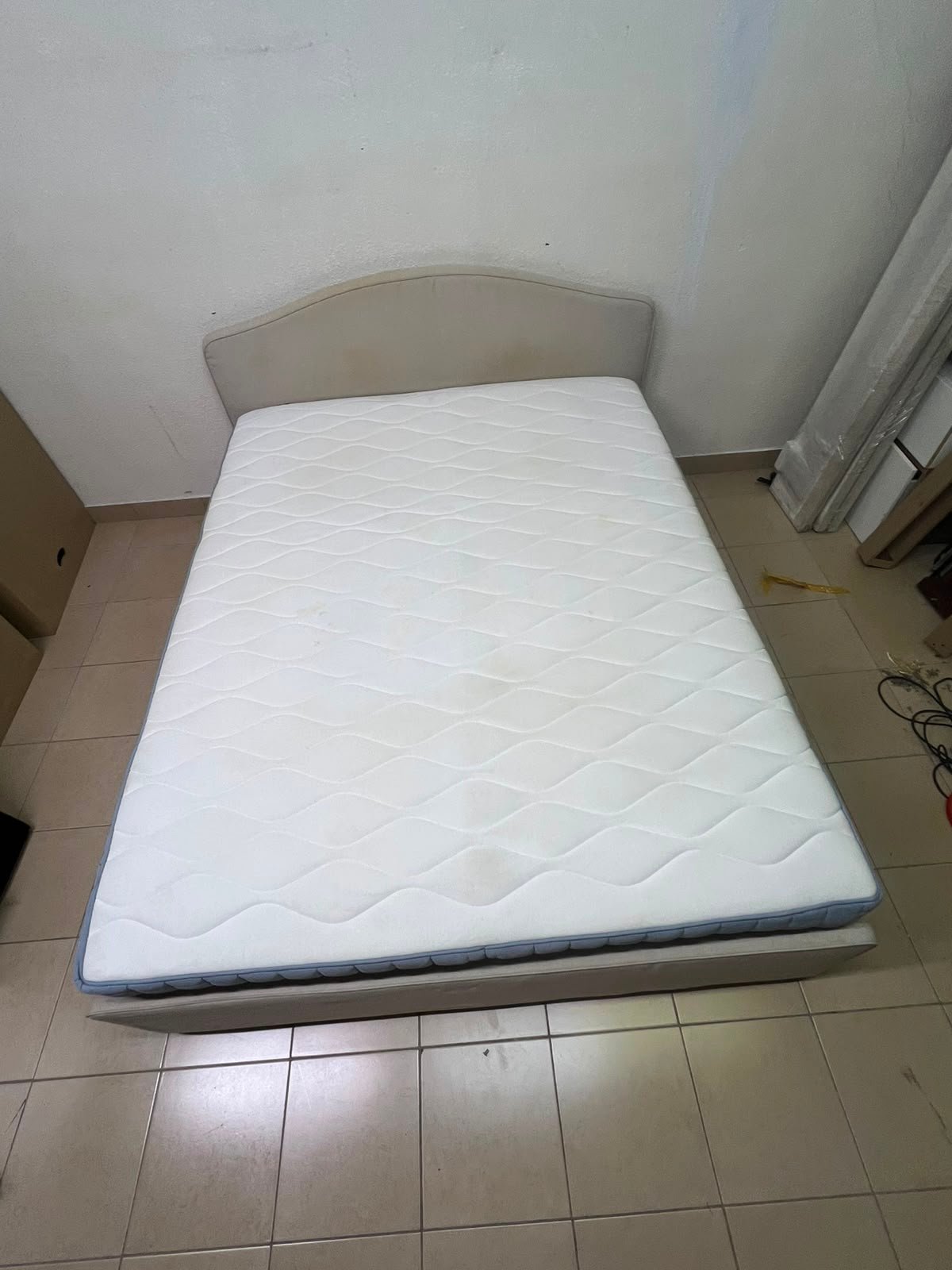 A bed from IKEA featuring a curved headboard and a beige upholstered base. - Image 11