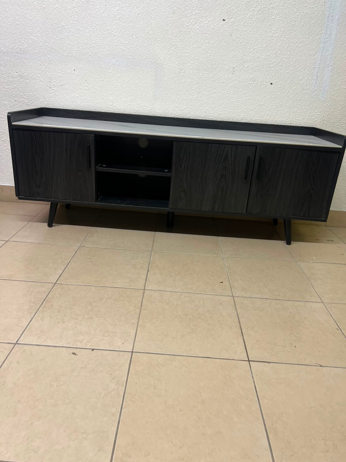 VEELOK brand TV unit with a modern design and black wooden legs - Image 2