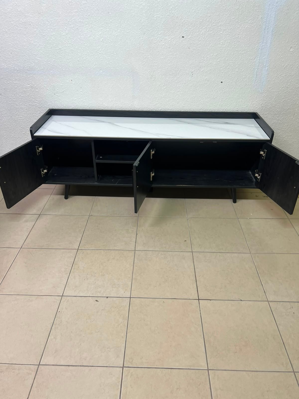 VEELOK brand TV unit with a modern design and black wooden legs - Image 11