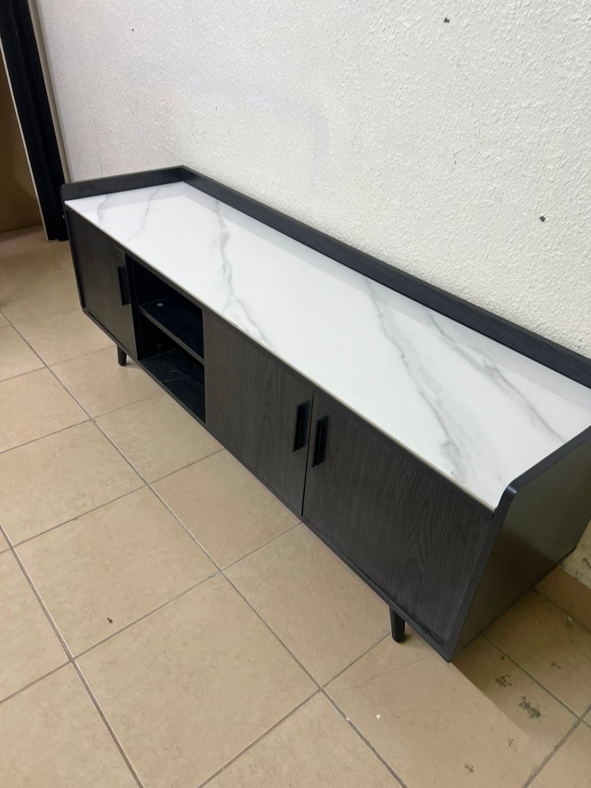 VEELOK brand TV unit with a modern design and black wooden legs - Image 16