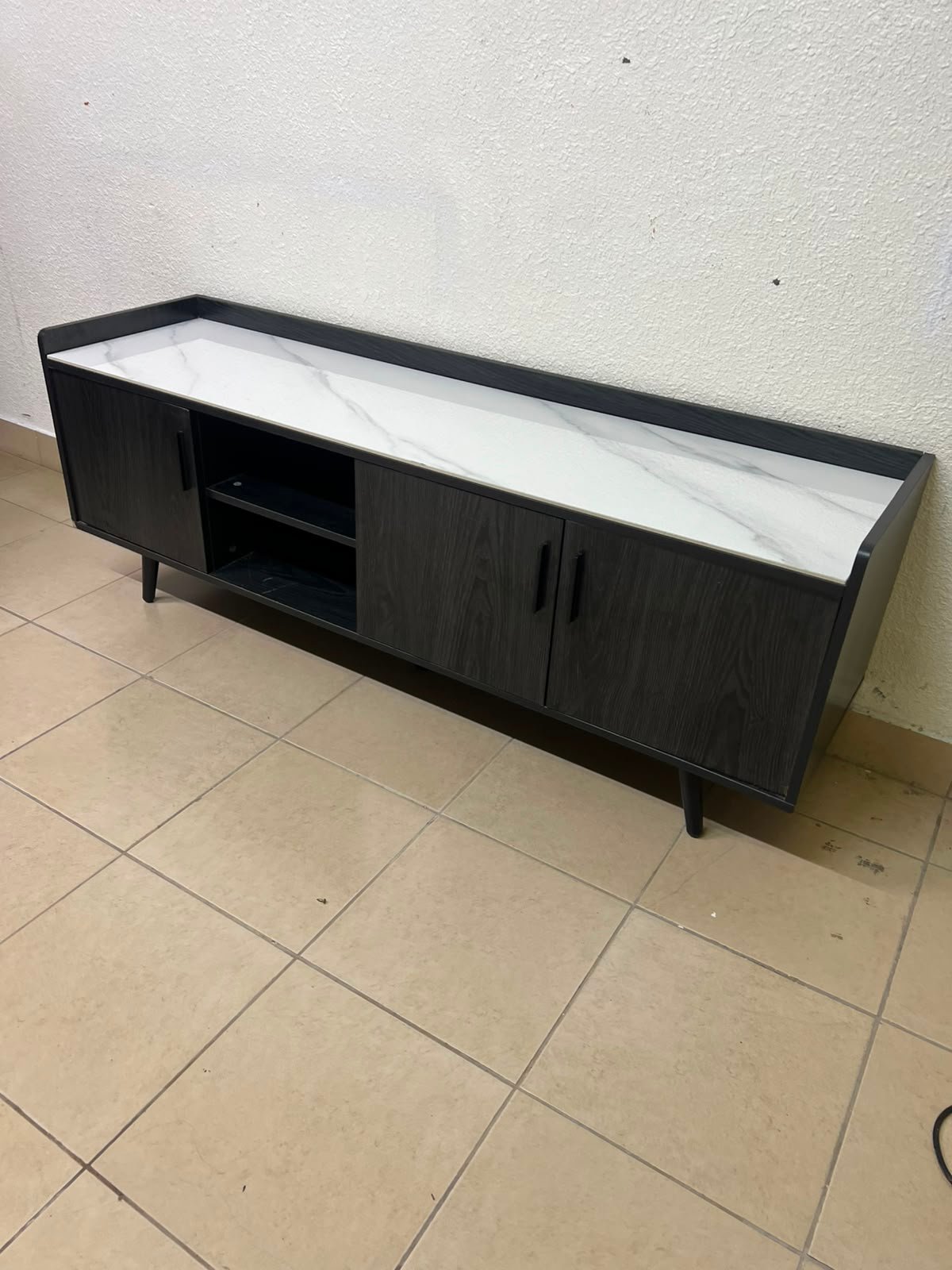 VEELOK brand TV unit with a modern design and black wooden legs - Image 6