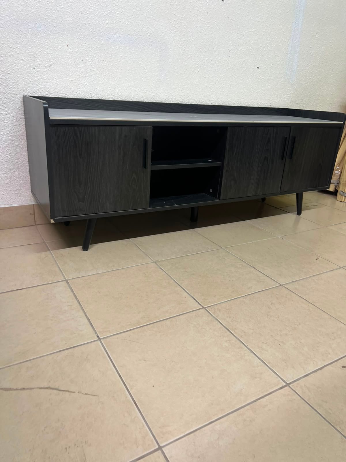 VEELOK brand TV unit with a modern design and black wooden legs - Image 15
