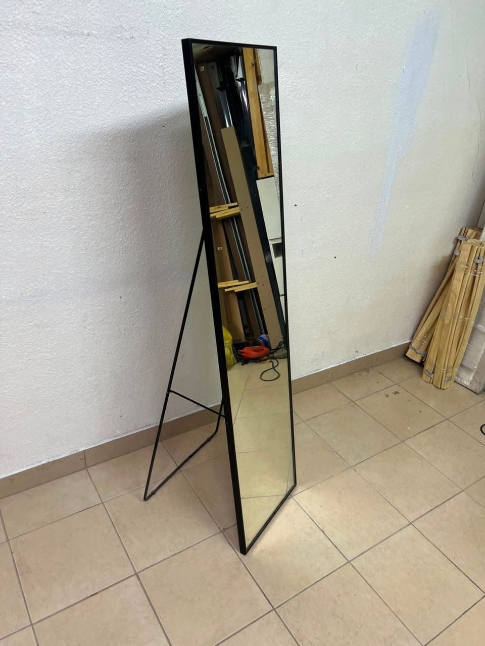 IKEA KARMSUND standing mirror with a slim black frame