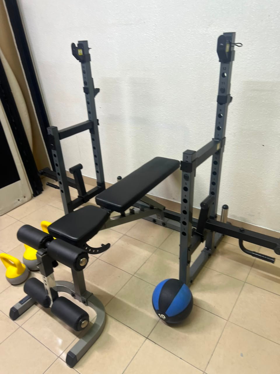 A complete home fitness equipment set including an adjustable push-up bench and weight rack. - Image 11