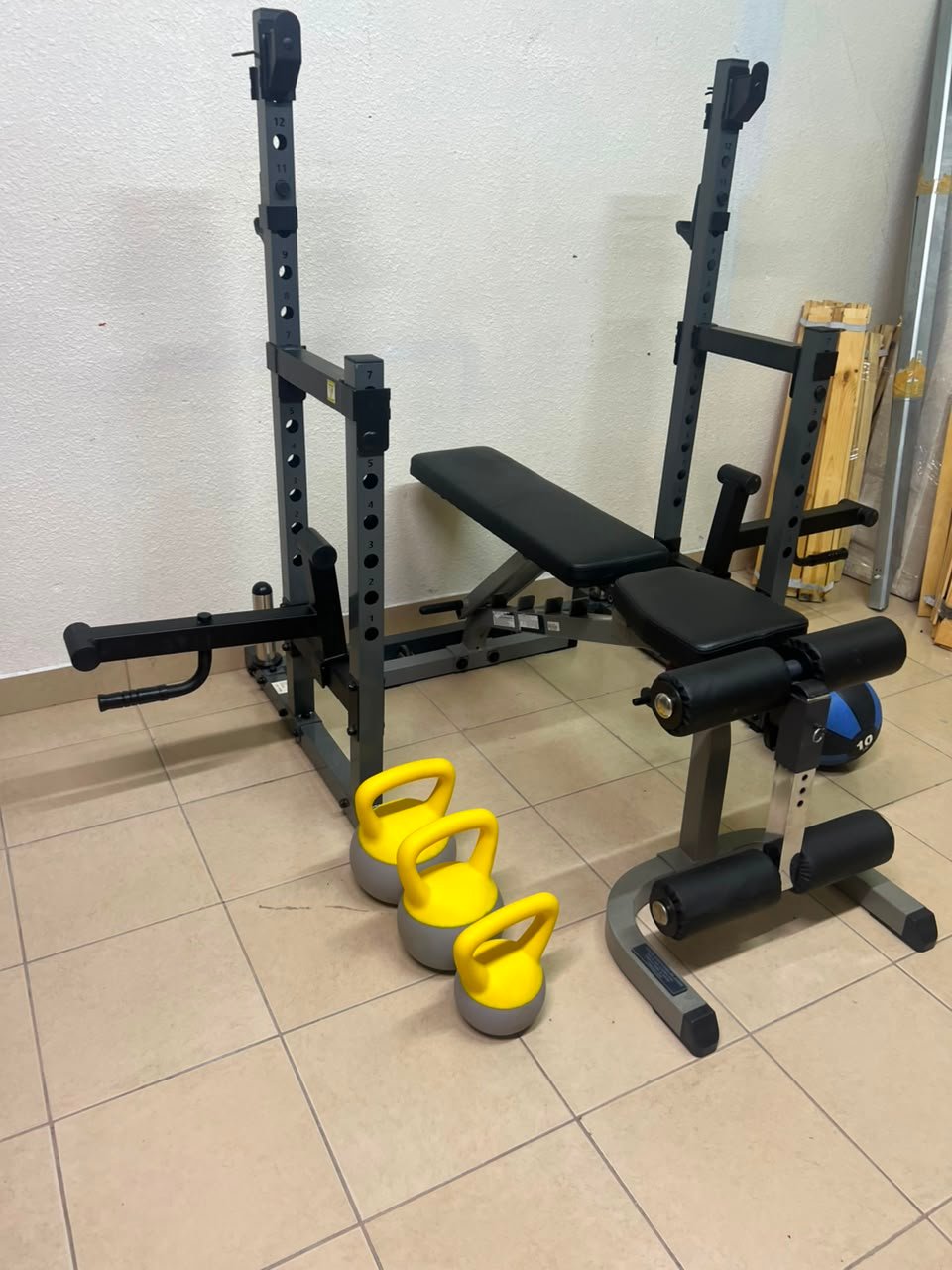 A complete home fitness equipment set including an adjustable push-up bench and weight rack. - Image 9