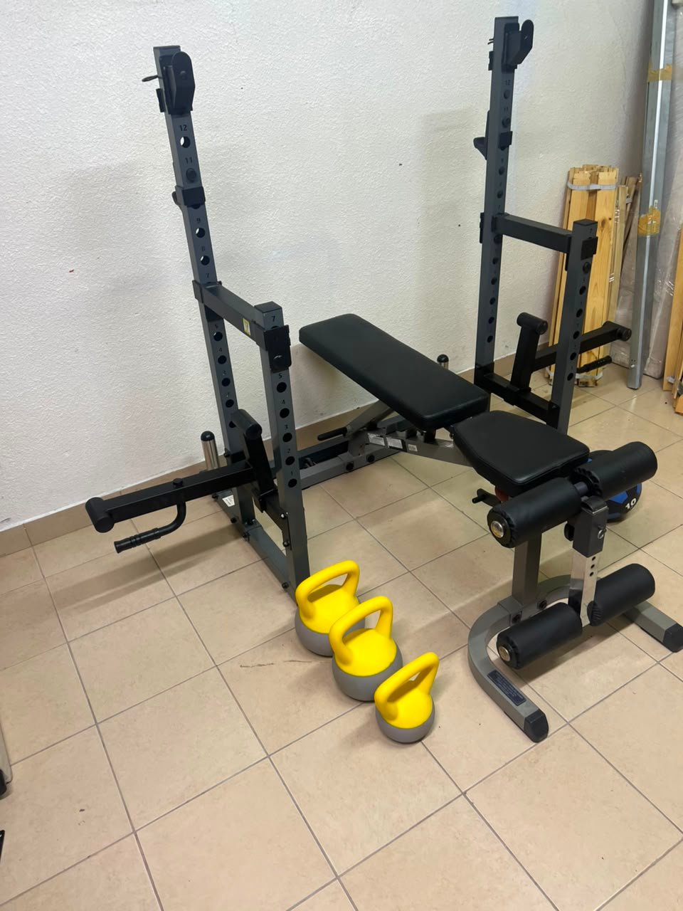 A complete home fitness equipment set including an adjustable push-up bench and weight rack. - Image 10