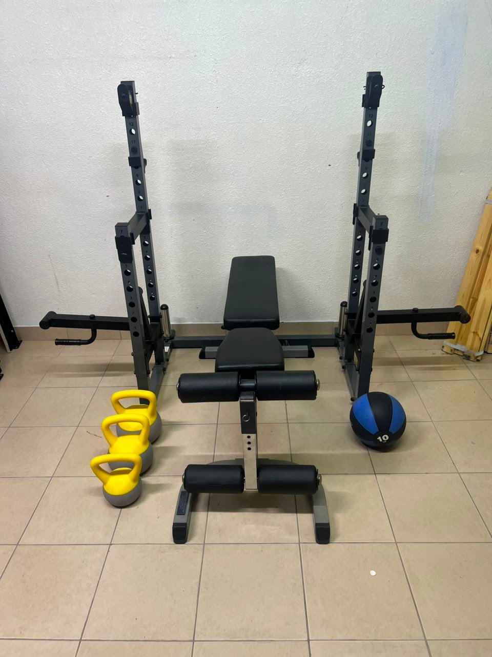 A complete home fitness equipment set including an adjustable push-up bench and weight rack. - Image 2