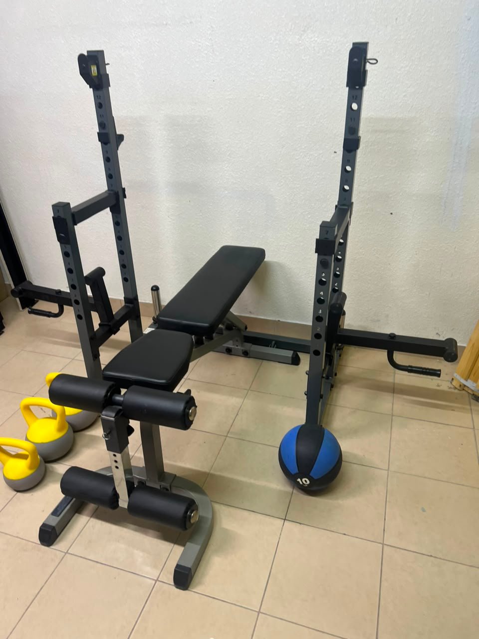 A complete home fitness equipment set including an adjustable push-up bench and weight rack. - Image 4