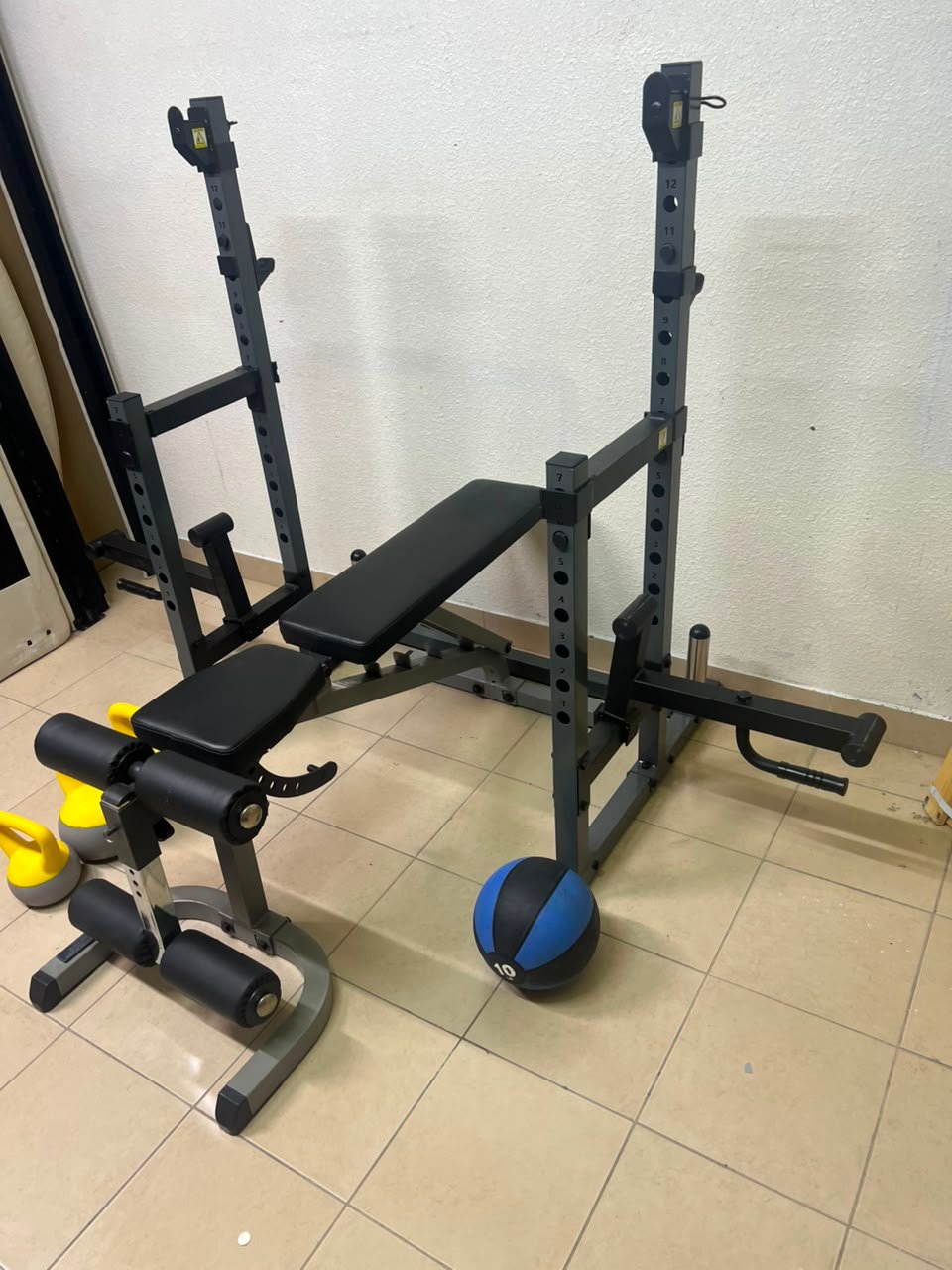 A complete home fitness equipment set including an adjustable push-up bench and weight rack. - Image 6