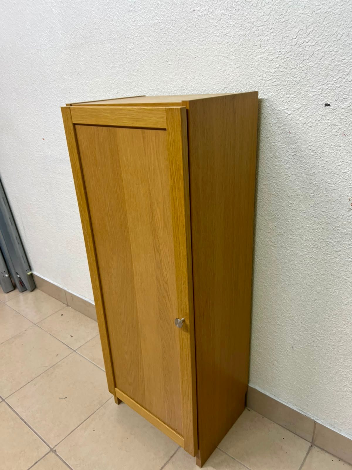A narrow storage cabinet, either IKEA-style or similar, featuring a natural oak veneer finish. - Image 4