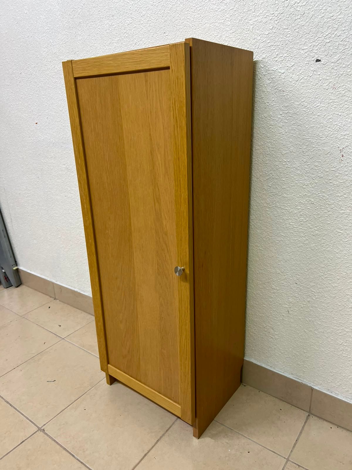 A narrow storage cabinet, either IKEA-style or similar, featuring a natural oak veneer finish. - Image 9