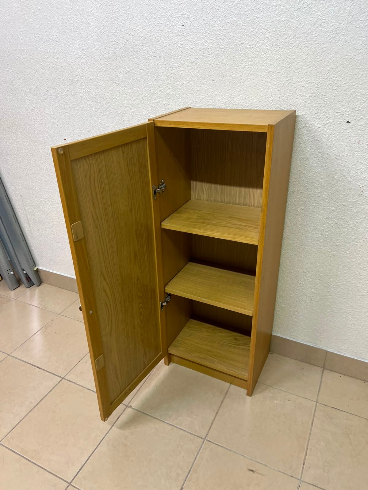 A narrow storage cabinet, either IKEA-style or similar, featuring a natural oak veneer finish. - Image 5