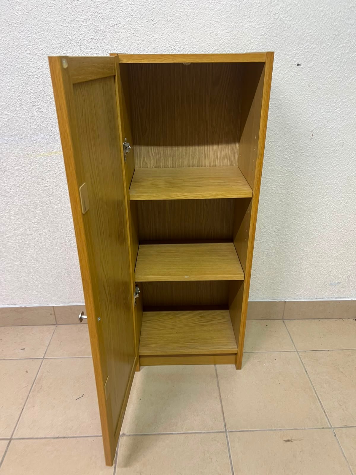 A narrow storage cabinet, either IKEA-style or similar, featuring a natural oak veneer finish. - Image 6