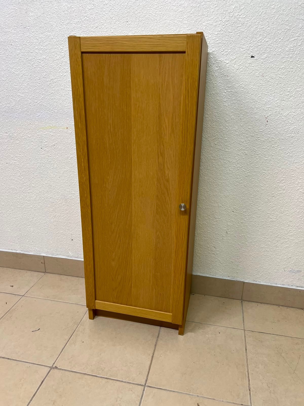 A narrow storage cabinet, either IKEA-style or similar, featuring a natural oak veneer finish. - Image 13