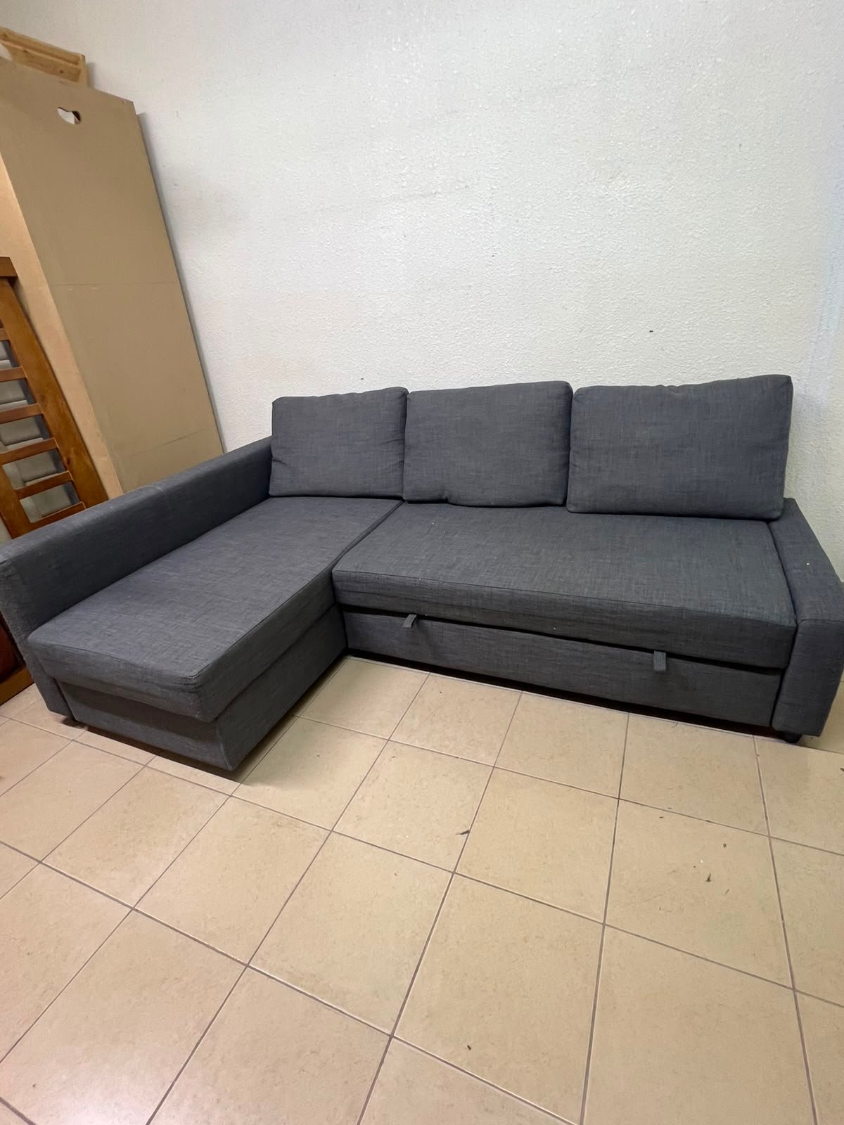 Corner sofa-bed with storage