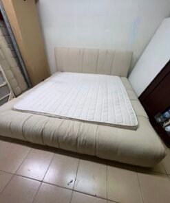 Beige upholstered double bed with mattress - good condition