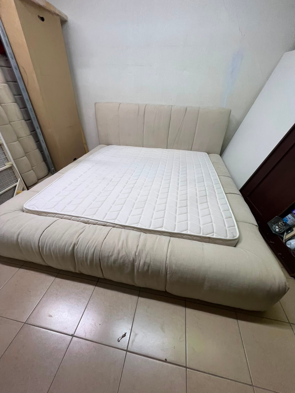 Beige upholstered double bed with mattress - good condition