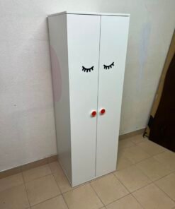 Whimsical Kids' Wardrobe with Sleeping Eyes Design – White 2-Door Storage Cabinet with Red Handles - Image 5