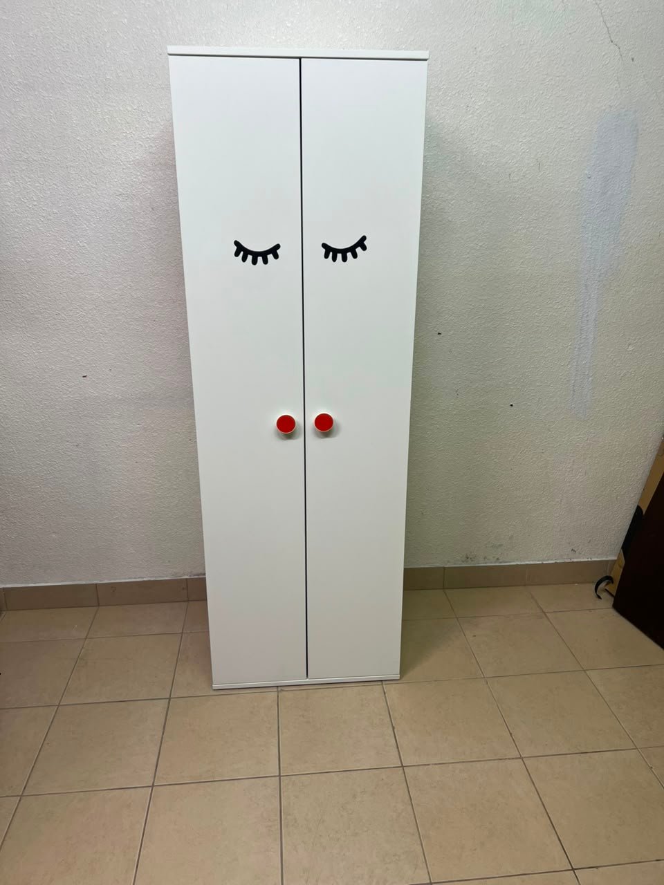 Whimsical Kids' Wardrobe with Sleeping Eyes Design – White 2-Door Storage Cabinet with Red Handles - Image 8