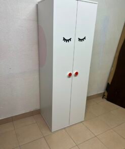 Whimsical Kids' Wardrobe with Sleeping Eyes Design – White 2-Door Storage Cabinet with Red Handles - Image 9