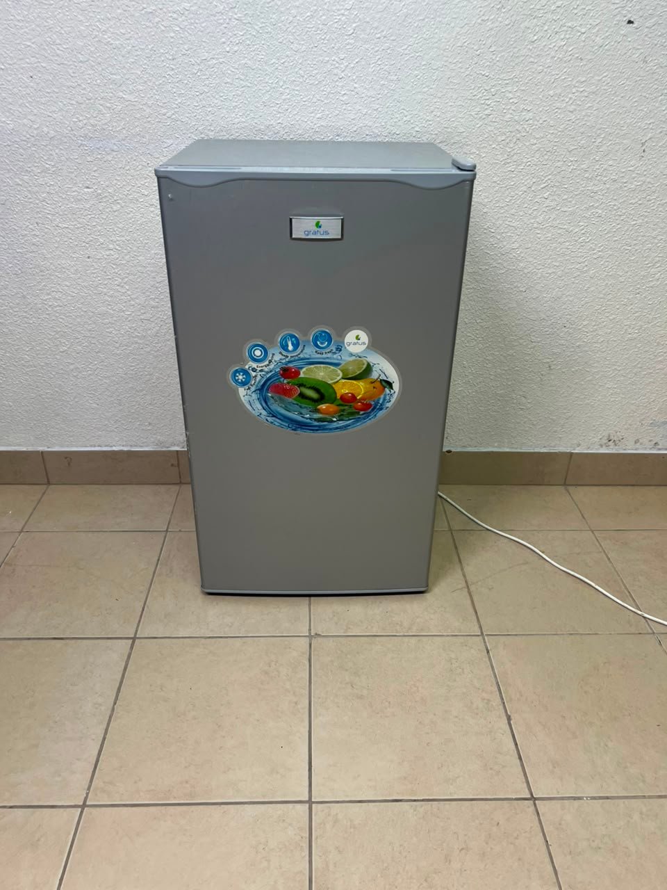 Compact single-door refrigerator in good working condition
