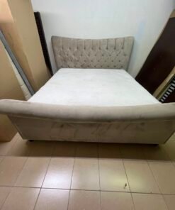 A classic diamond-patterned quilted bed with a mattress featuring soft velvet fabric in beige or gray. - Image 6