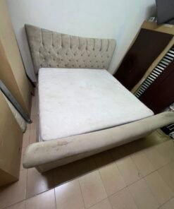 A classic diamond-patterned quilted bed with a mattress featuring soft velvet fabric in beige or gray. - Image 8
