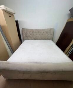 A classic diamond-patterned quilted bed with a mattress featuring soft velvet fabric in beige or gray. - Image 12