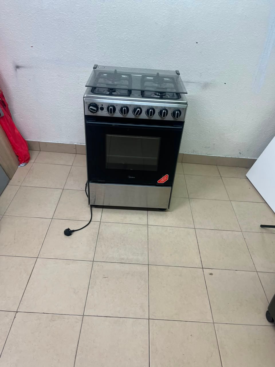 Midea Freestanding 4-Burner Gas Cooker with Oven – Stainless Steel Stove with Foldable Glass Lid & Storage Drawer - Image 2