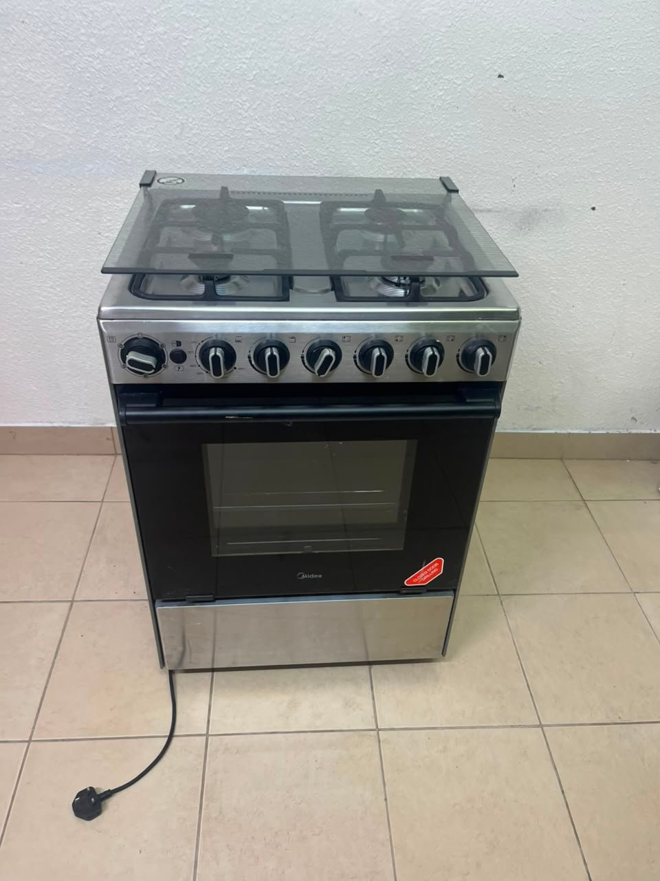 Midea Freestanding 4-Burner Gas Cooker with Oven – Stainless Steel Stove with Foldable Glass Lid & Storage Drawer - Image 6