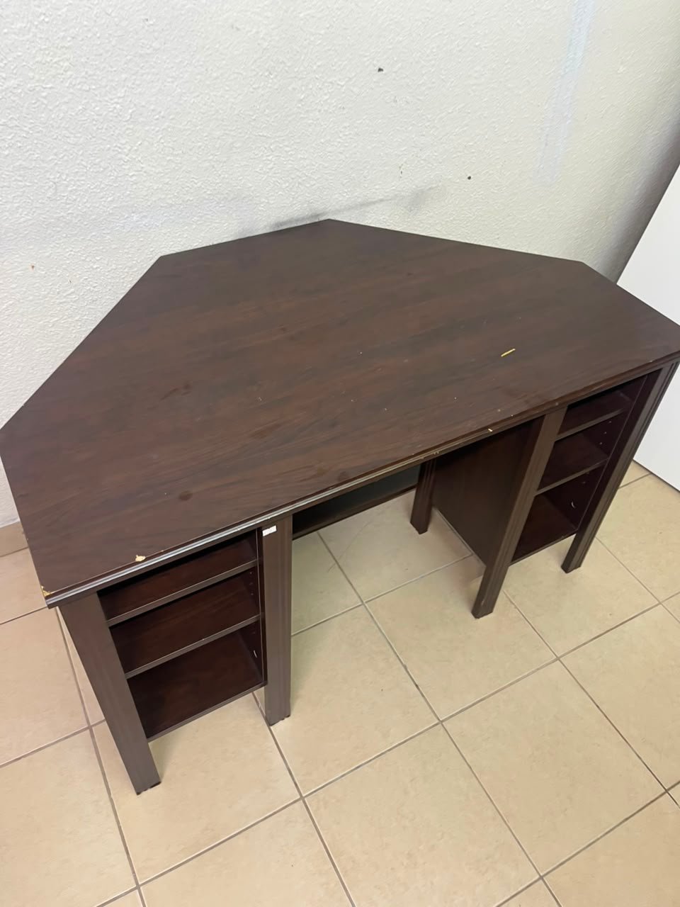 IKEA BRUSALI corner desk in brown featuring built-in storage shelves on the sides. - Image 6