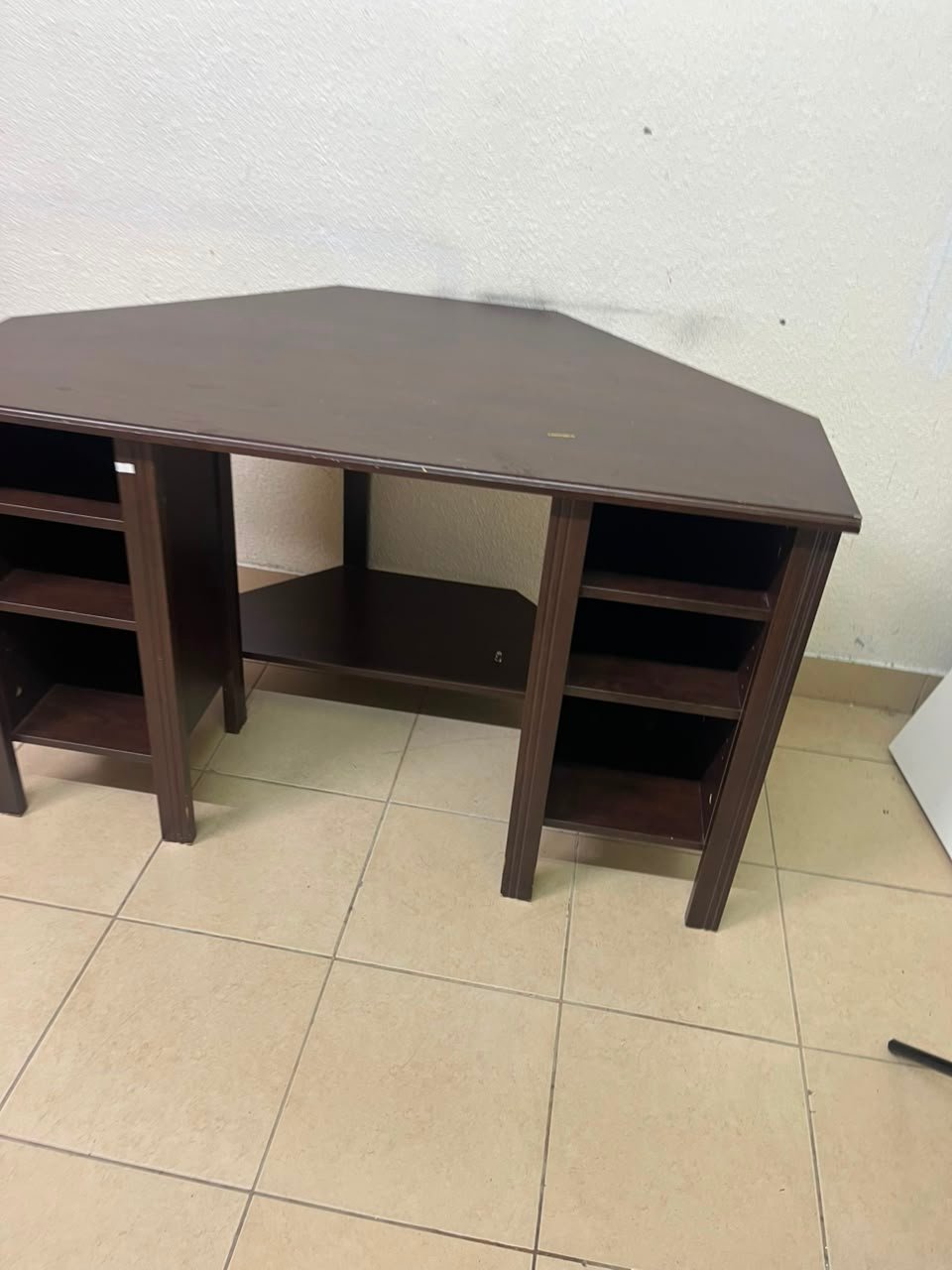 IKEA BRUSALI corner desk in brown featuring built-in storage shelves on the sides. - Image 7