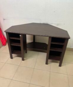 IKEA BRUSALI corner desk in brown featuring built-in storage shelves on the sides. - Image 8