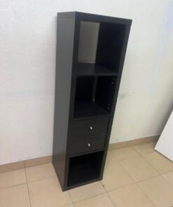 The IKEA KALLAX shelving unit, in black and brown, features a vertical design with built-in drawer units. - Image 5